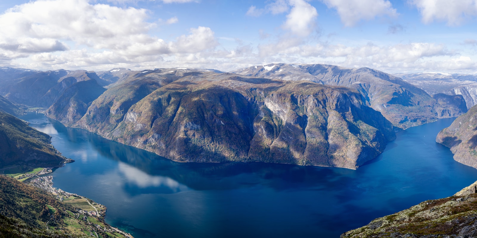 a large body of water surrounded by mountains